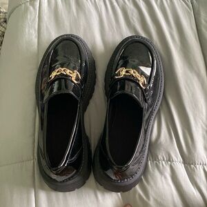 shiny black faux leather loafers